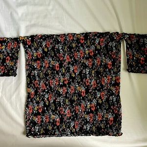 Black flowery top.